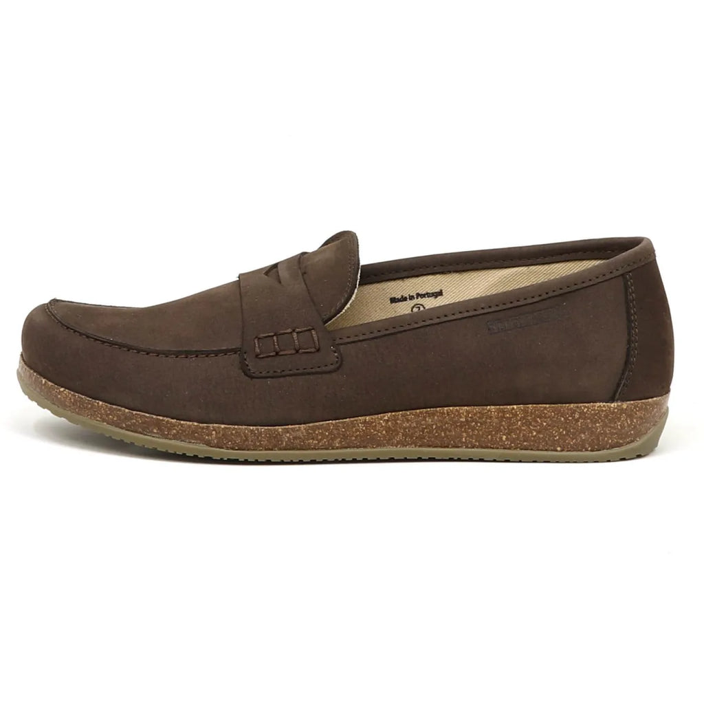 The Women's Victoria Loafer is a brown nubuck slip-on shown in profile on a white background. It features a cork sole, stitched seam across the top, shock-absorbing midsole, and offers ultimate arch support for all-day comfort.
