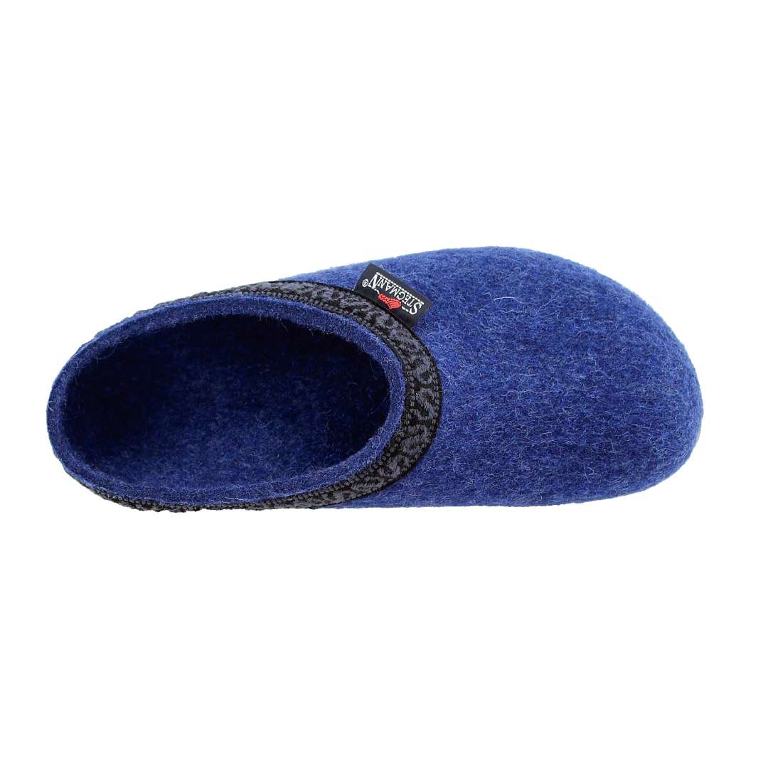 A single Women's Original 108 Wool Clog - Medium in blue, crafted from Merino wool felt and accented with a sleek black trim, is seen from above against a stark white background. Its cork & latex sole ensures comfort and durability with every step.