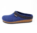 Women's shoe: The Women's Original 108 Wool Clog - Medium, a blue woolen slipper with a black patterned trim and cork & latex sole, elegantly crafted from Merino wool felt against a pristine white background.