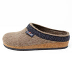 The Women's Original 108 Wool Clog - Medium, crafted from Merino wool felt with a cork and latex sole and adorned with a dark blue trim, is displayed on a white background.