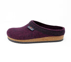A Women's Original 108 Wool Clog in dark burgundy, made of luxurious Merino wool felt with a stylish black trim, and designed with a comfortable cork & latex sole.