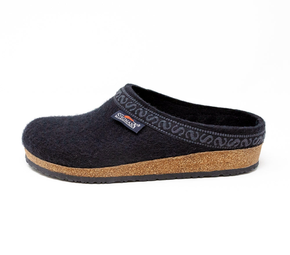 The Women's Original 108 Wool Clog - Medium is a black slip-on crafted from Merino wool felt, featuring a cork & latex sole and decorative trim for the perfect blend of comfort and style in a women's shoe.