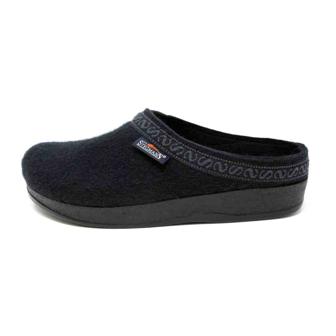 Men's WoolFlex Wool Clog in black, slip-on Merino wool design with embroidered trim and thick supportive sole with arch support, displayed side view on a plain white background.