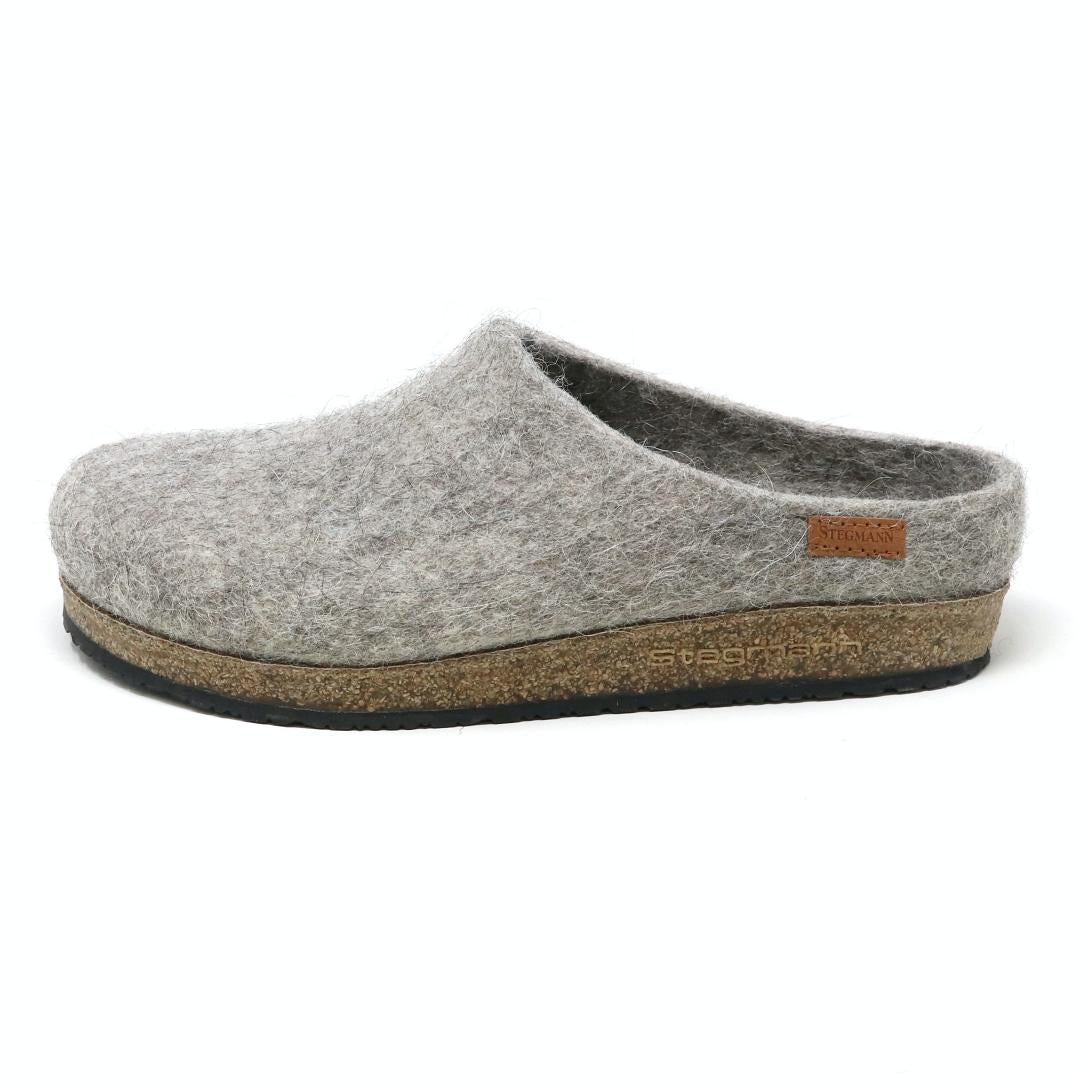 Men's Eco Wool Clog crafted from sustainable wool, with a gray felt design, cork sole, and a small brown tag on the side.