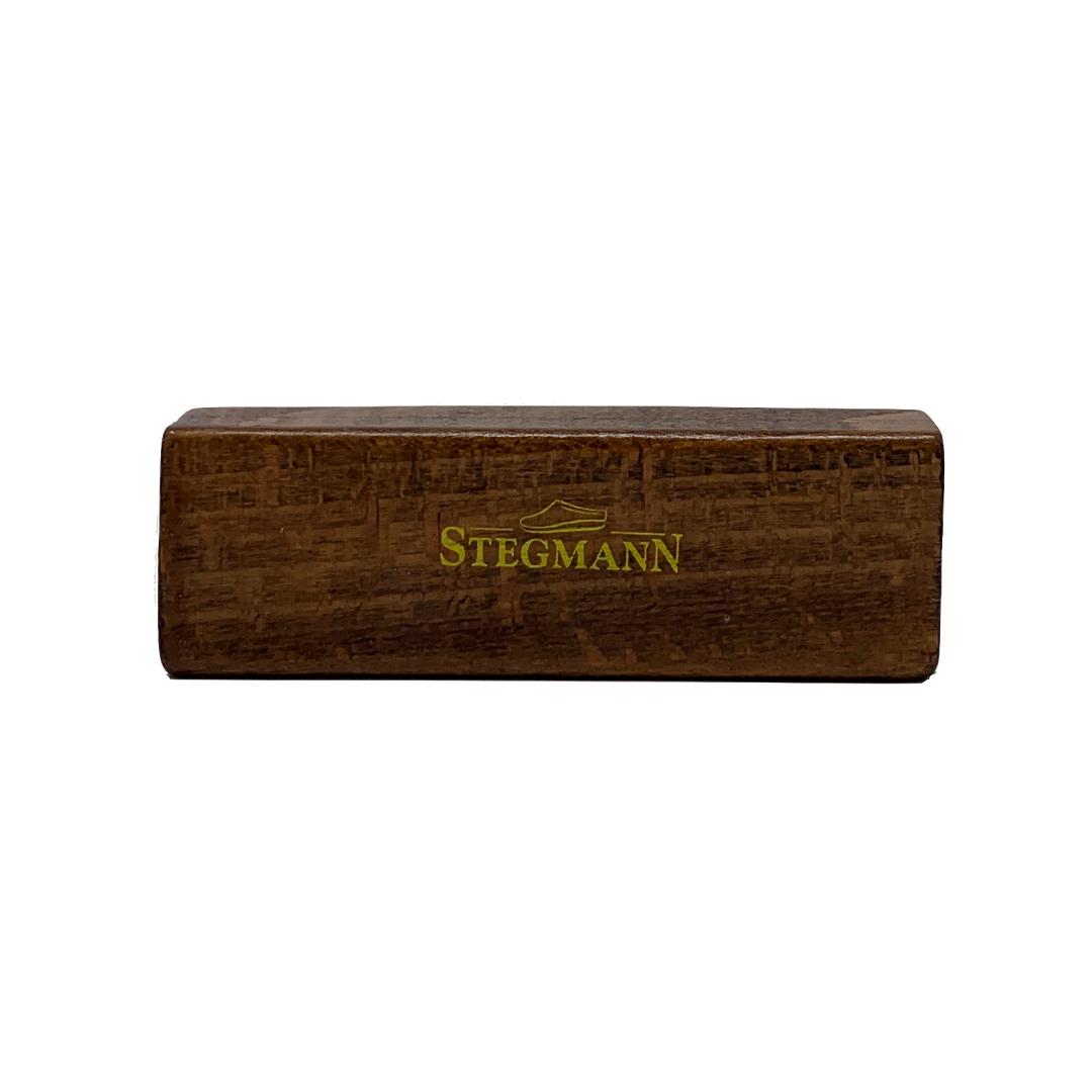 The Wool & Felt Care Brush, with "STEGMANN" printed in yellow, is perfect for showcasing your Stegmann Clogs collection or organizing care accessories in style.