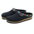 Women's Edelweiss Wool Clogs in dark felt feature cozy Merino wool, cork soles, and a vibrant embroidered floral band around the opening, displayed against a plain background.