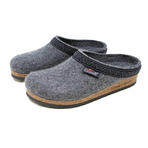 The Women's Original 108 Wool Clog - Medium boasts merino wool felt construction, cork and latex soles, elegant black trim, and a small logo on the side.
