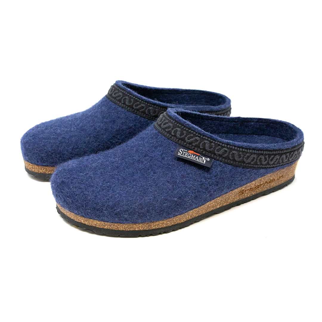 The Women's Original 108 Wool Clog - Medium is made from luxurious blue Merino wool felt with black trim and features comfortable cork and latex soles.