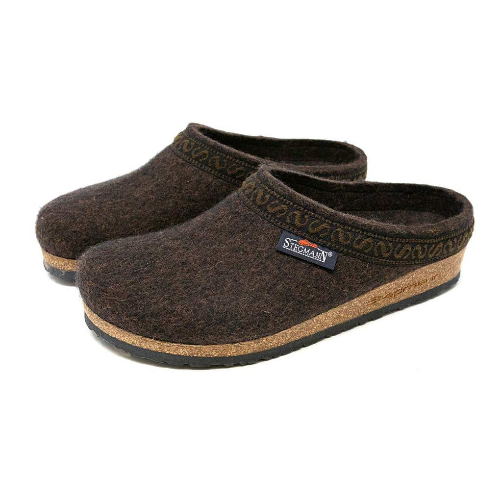 The Women's Original 108 Wool Clog - Seasonal Colors are made from brown Merino wool felt with cork and latex soles and include a small brand label on the side.