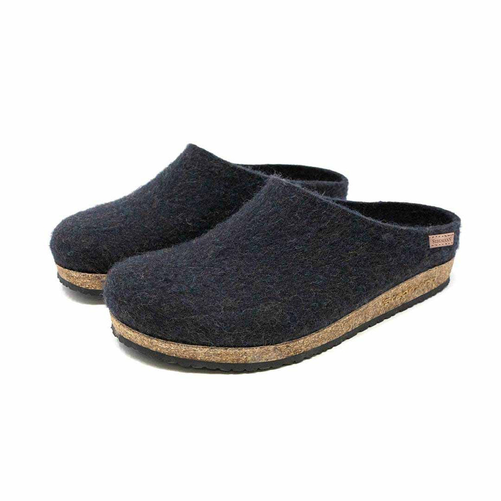 A pair of Women's Essenz Wool Clogs in dark gray Merino wool featuring cork soles and black rubber bottoms.