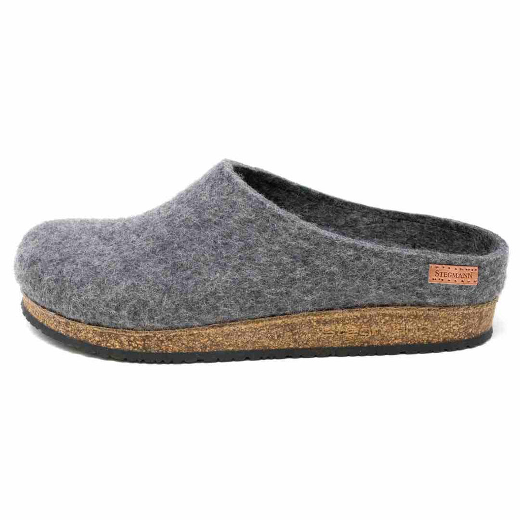 Introducing the Women's Essenz Wool Clog, crafted from gray Merino wool with a comfortable thick cork/latex footbed and featuring a small side tag.
