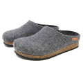The Women's Essenz Wool Clog, an elegant pair of gray felt clogs crafted from Merino wool with cork soles, is showcased against a pristine white background.