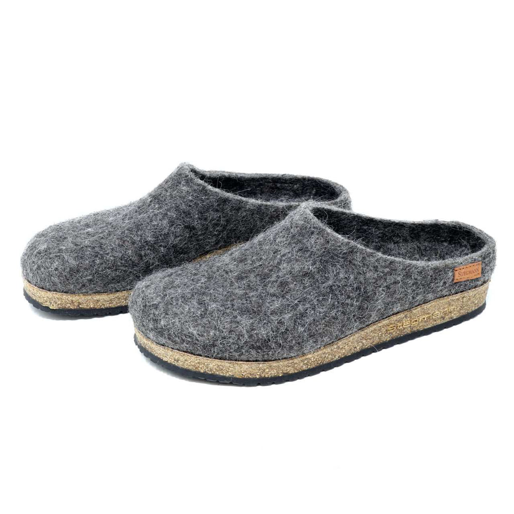 A pair of Men's Eco Wool Clogs crafted from sustainable wool with cork soles on a white background.