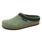 **Men's Original 108 Wool Clog**: A green slipper designed for men, crafted from Merino wool with a cork base, black support sole, and decorative trim.